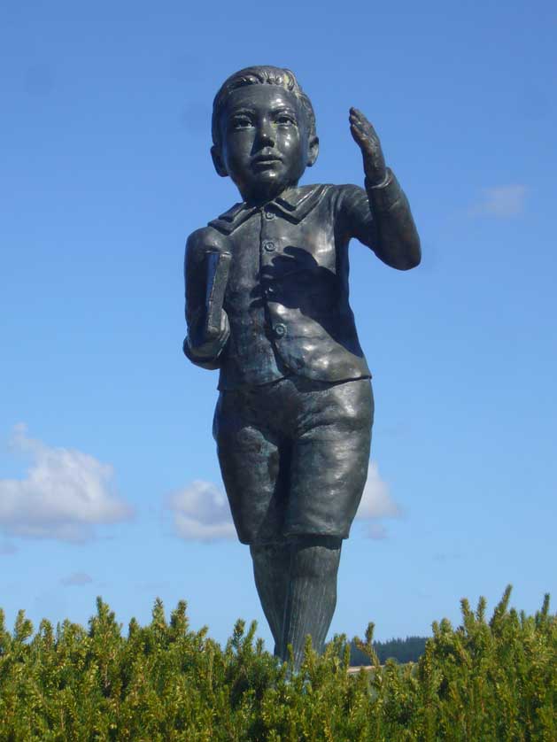 A statue of a young Ernest Rutherford at his memorial in Brightwater, New Zealand