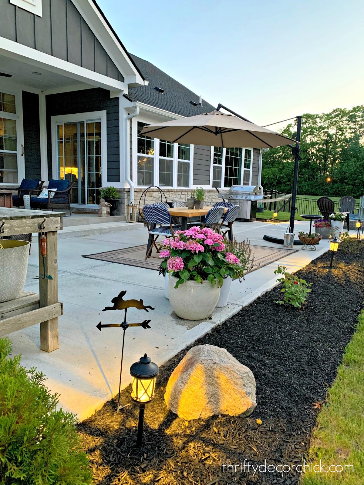 Long backyard patio with fire pit