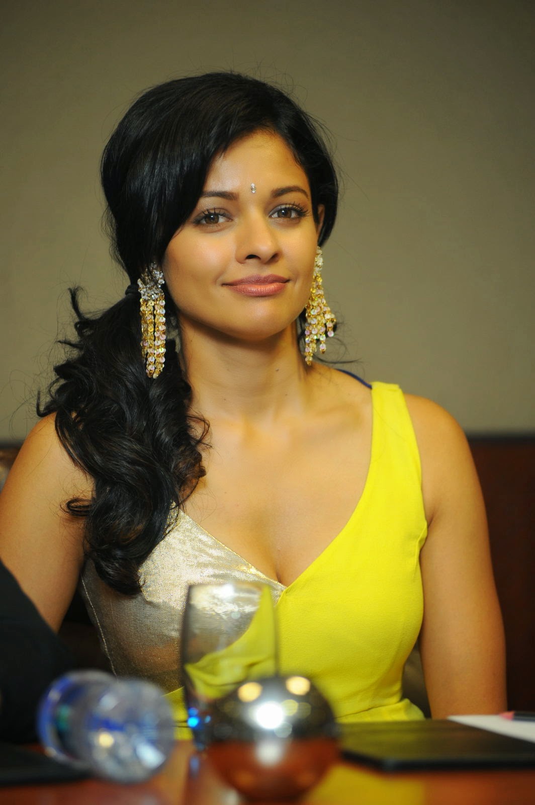 Actress Pooja Kumar Hot Stills In Yellow Dress Cap