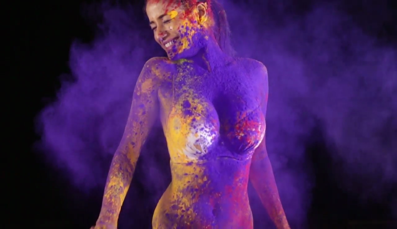 Poonam Pandey covered in colors