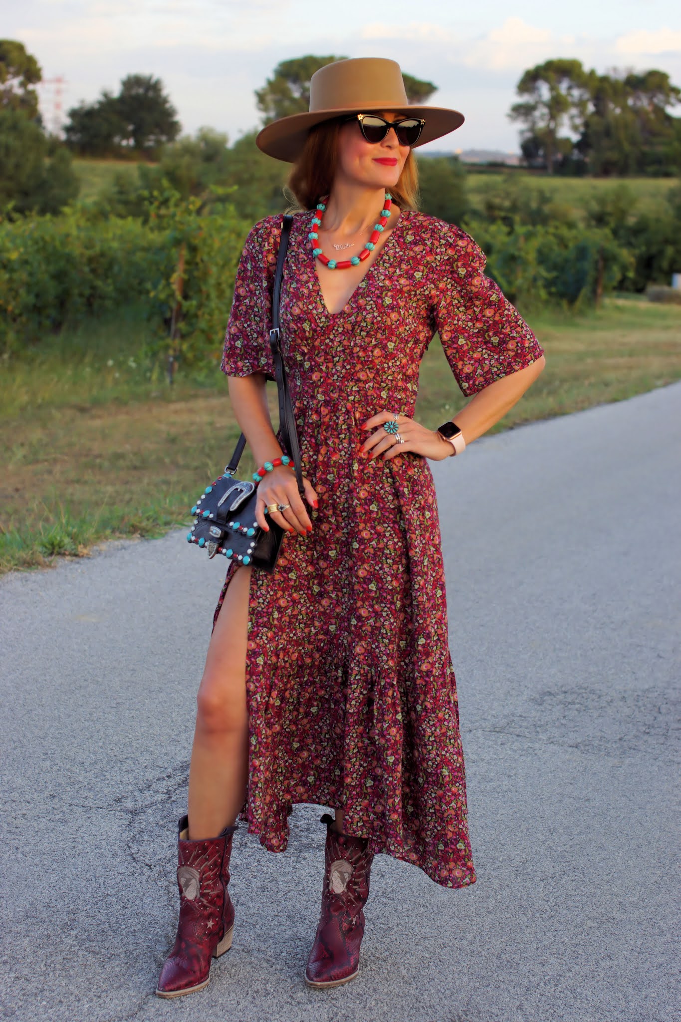 A transitional western style outfit with a ba&sh Paris dress and Lack of Color hat