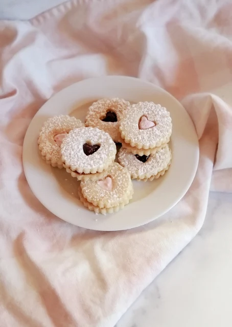 plate of valentine heart linzer cookies