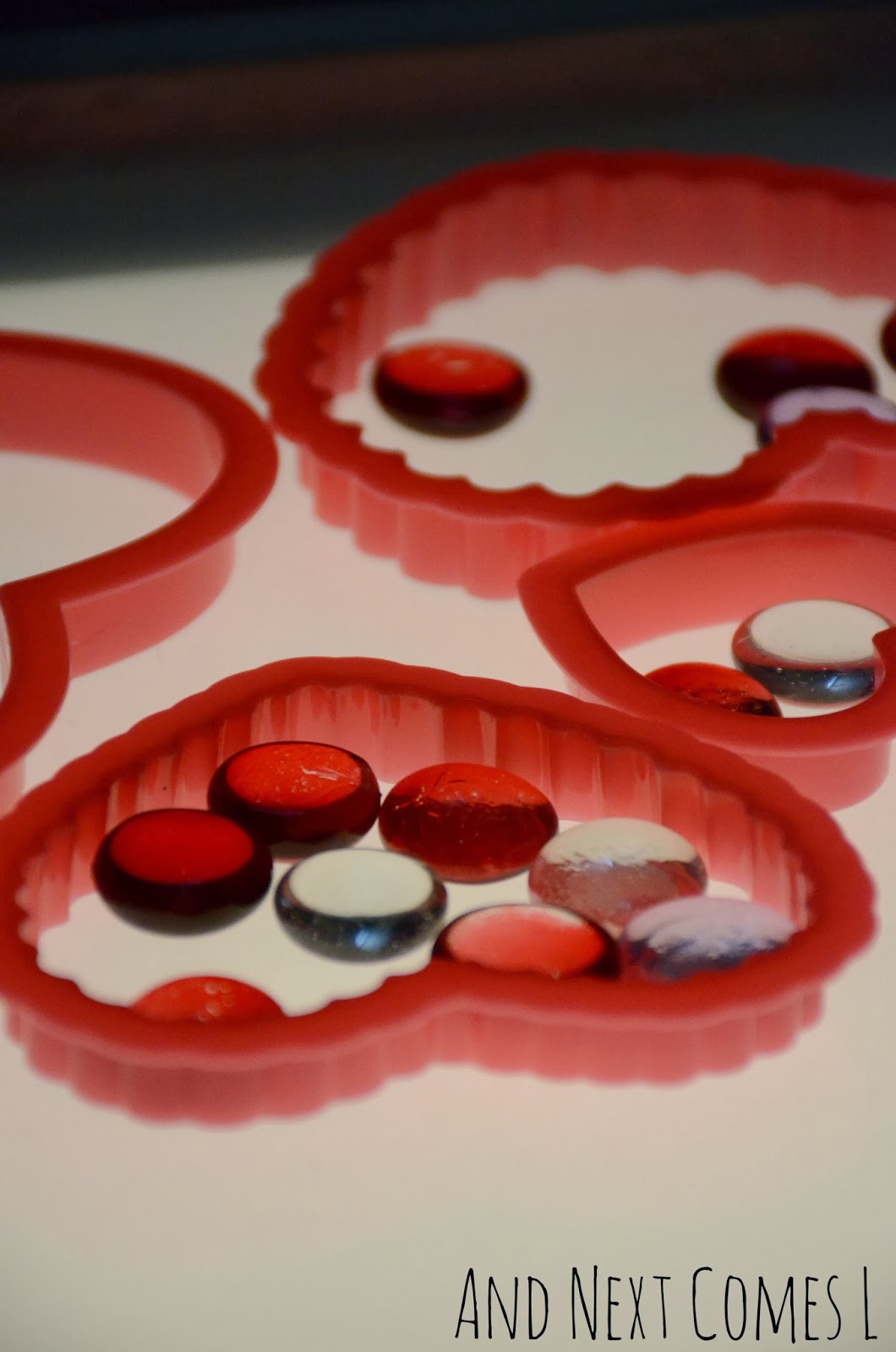 Heart Cookie Cutters on the Light Table {Valentine's Day Light Table ...
