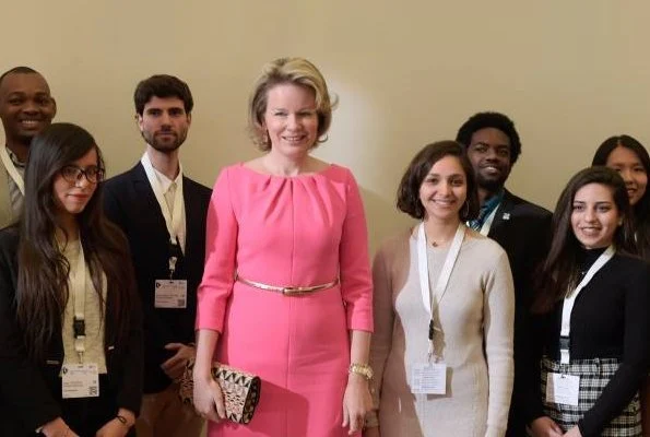 Queen Mathilde wore a pink midi dress by Natan. Natan is a fashion house founded by Edouard Vermeulen