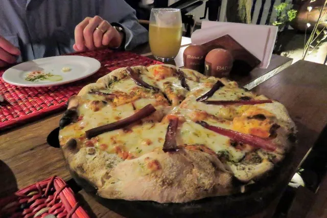 Peru foods: Cured alpaca pizza at Pachapapa in Cusco