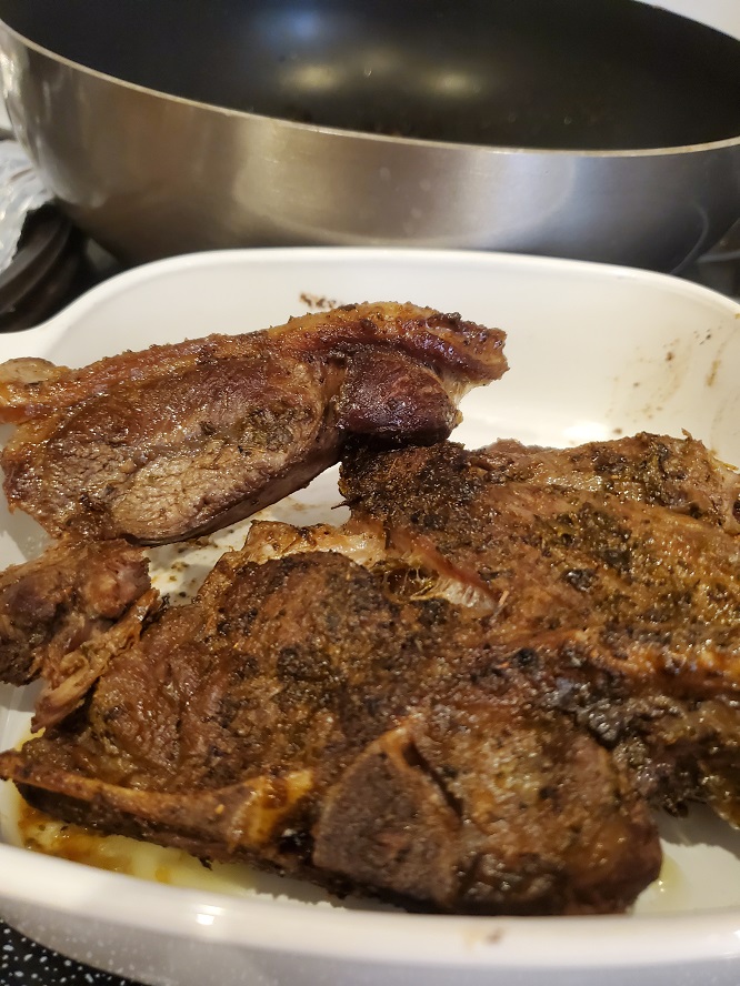 this is two lamb shoulder chops browned before cutting up to add to the stew