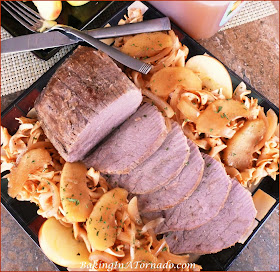 Slow Cooked Apple Cider Beef Roast, a roast slow cooked with onions and apples in a cider based braise. An easy special meal for any night. | Recipe developed by www.BakingInATornado.com | #SlowCooker  #beef #dinner