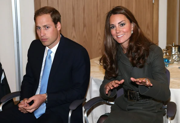 Kate Middleton wore Alexander McQueen green wool coat and Gianvito Rossi shoes, Prada dress