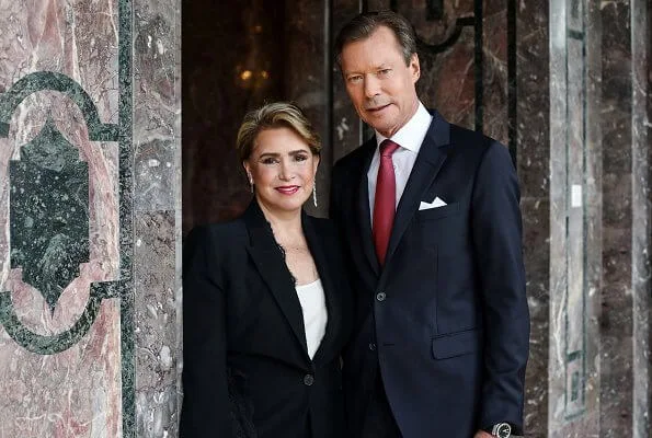 Grand Duchess Maria Teresa wore a new black open sleeves lace trimmet viscose crepe jacket from Alexander McQueen