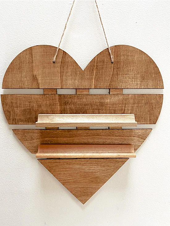 Stained hanging wooden heart with shelves