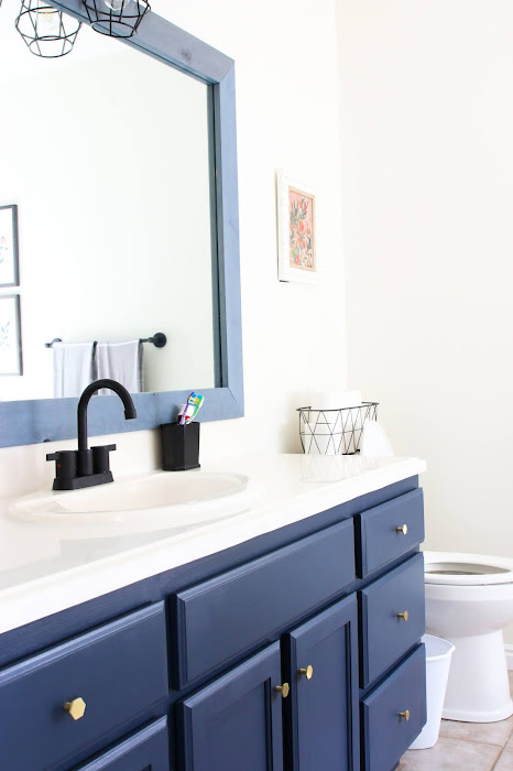 Modern farmhouse bathroom vanity. Modern farmhouse bathroom decor. Farmhouse bathroom ideas. Rustic farmhouse bathroom. Modern farmhouse bathroom fixtures. Farmhouse bathroom shower. Farmhouse bathroom pictures. Modern farmhouse bathroom tile. Budget friendly bathroom renovation. Hale navy bathroom vanity. Gold bathroom hardware. #bathroom #farmhouse #modernfamrhouse #decor #modern #rustic Modern farmhouse bathroom vanity. Modern farmhouse bathroom decor. Farmhouse bathroom ideas. Rustic farmhouse bathroom. Modern farmhouse bathroom fixtures. Farmhouse bathroom shower. Farmhouse bathroom pictures. Modern farmhouse bathroom tile. Budget friendly bathroom renovation. Hale navy bathroom vanity. Gold bathroom hardware. #bathroom #farmhouse #modernfamrhouse #decor #modern #rustic