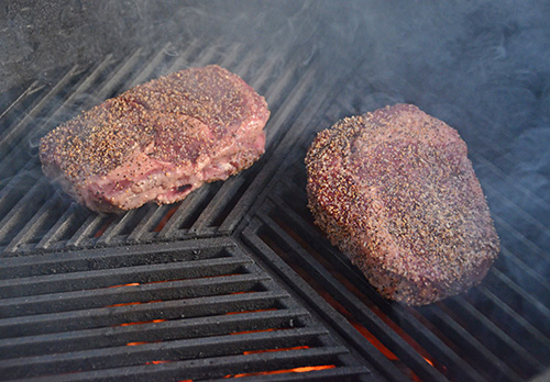 Certified Angus Beef ribeyes on a Big Green Egg kamado grill with Craycort cast iron grates