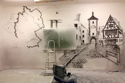 Malowanie graffiti w szkole językowej, obraz monochromatyczny w czarno-bieli. mural 3D warszawa Malowanie murali