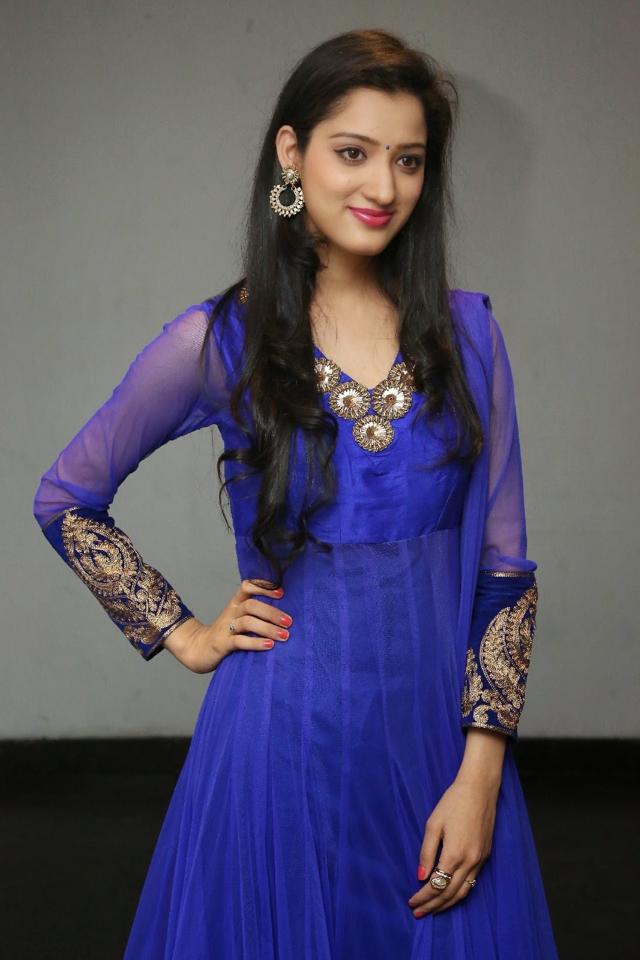 Telugu Actress Richa Panai Long Hair Stills In Blue Dress