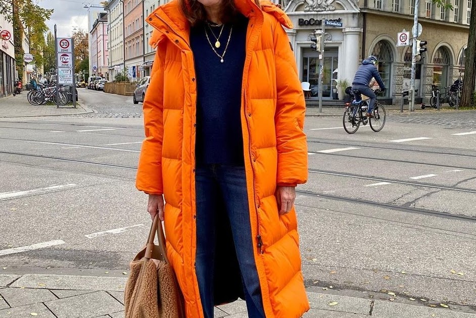 How to wear orange coat Orange coat street styles. Melody Jacob