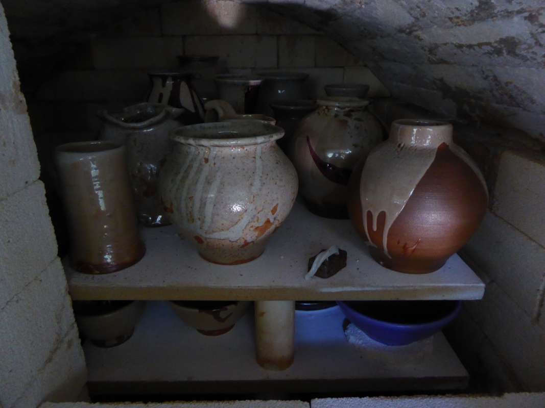 Unloading the wood fired kiln.