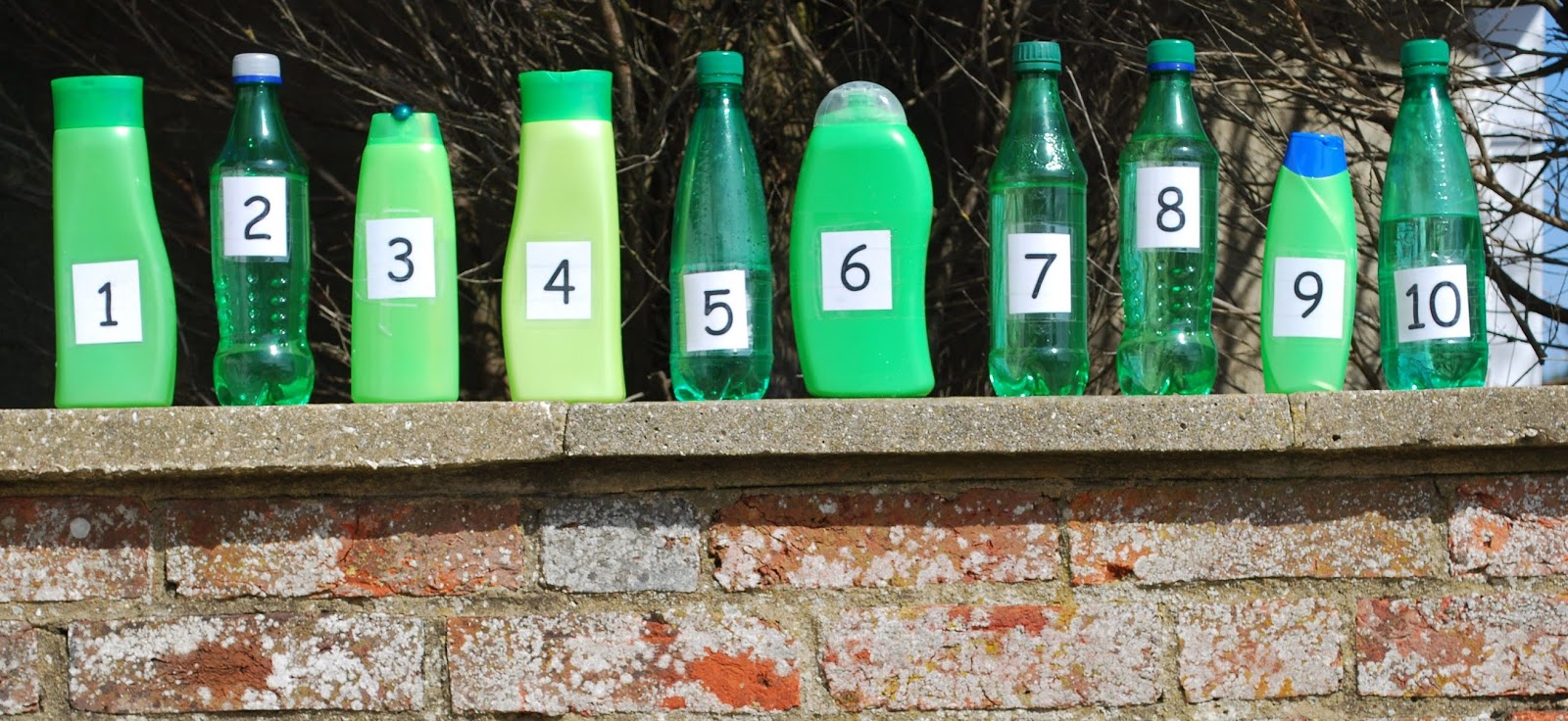 CRA in English Ten green bottles hanging on a wall