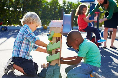 school children playing outside 