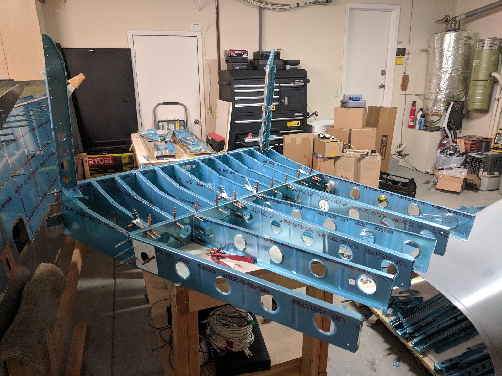 Damazio family's RV-10 project: Mid-fuselage ribs started