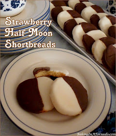 Strawberry Half Moon Shortbreads are crunchy strawberry flavored cookies dipped in chocolate and white chocolate. | Recipe developed by www.BakingInATornado.com | #recipe #cookies