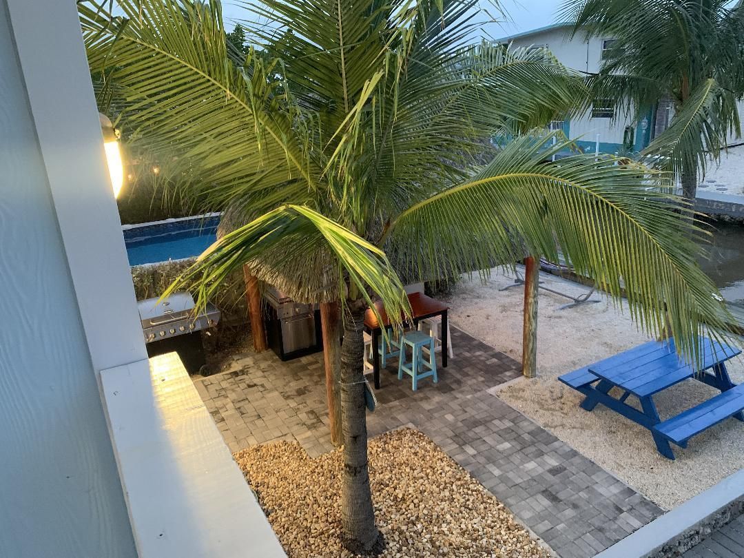 Real Estate in the Florida Keys Concrete Pilings, frame canal front