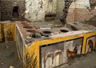 Scientists discover ancient frescoed hot food and drinks shop in city buried in volcanic eruption in 79AD - News