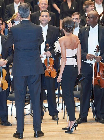 Queen Letizia wore The 2nd Skin Co. strapless neckline top and straight trousers, Prada black leather pumps, black diamond earrings