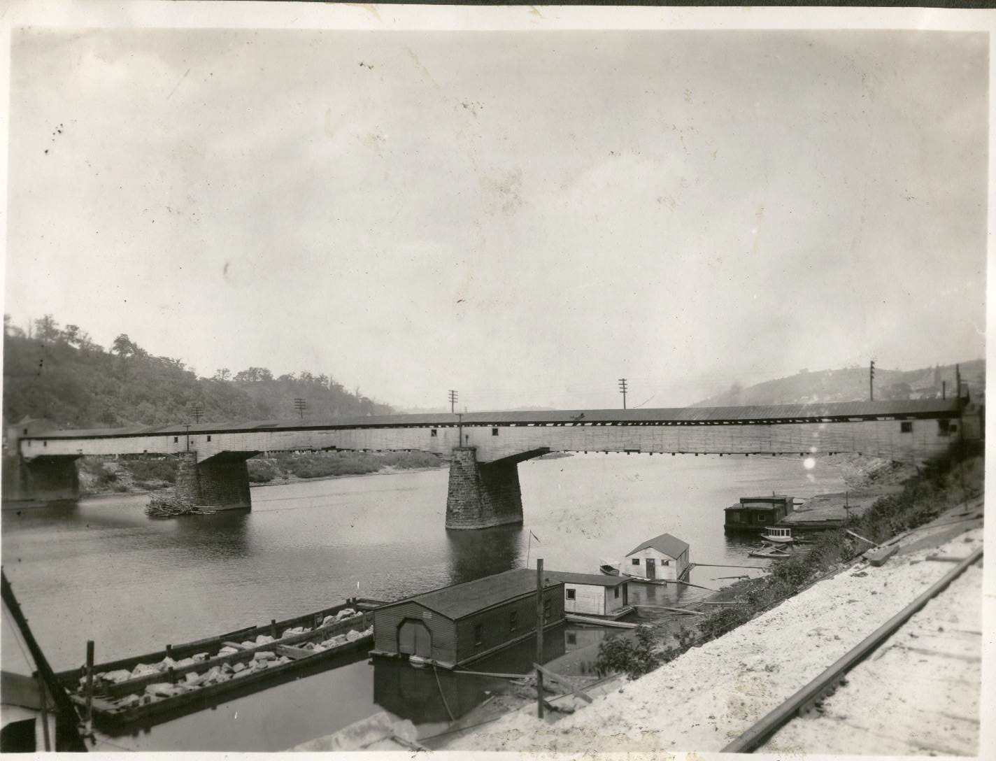 Brownsville, PA And It's Old Covered Bridge Over The Monongahela River