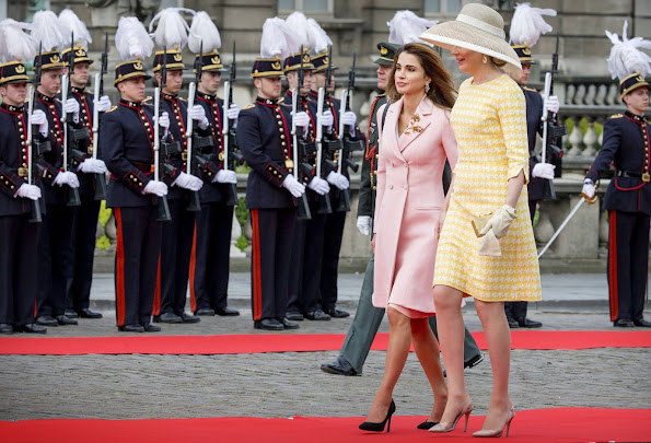 King Philippe and Queen Mathilde of Belgium welcome King Abdullah and Queen Rania of Jordan during an official welcome ceremony at the Royal Palace in Brussels