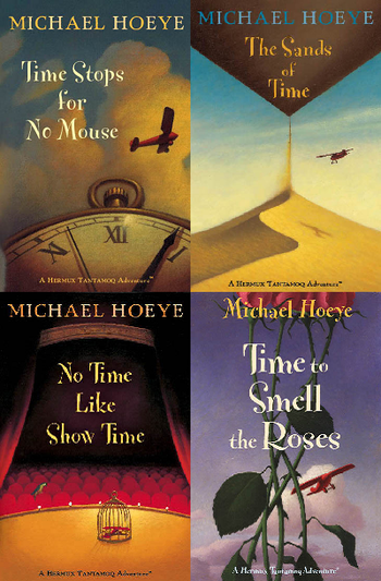 Momo celebrating time to read: Time stops for no Mouse by Michael Hoeye