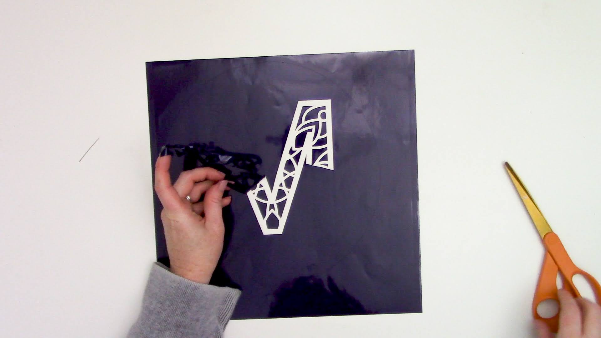 The Secret to NoBleed Vinyl Stencils When Painting on Canvas