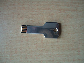 This image has an empty alt attribute; its file name is Pendrive_Shape_of_key.jfif
