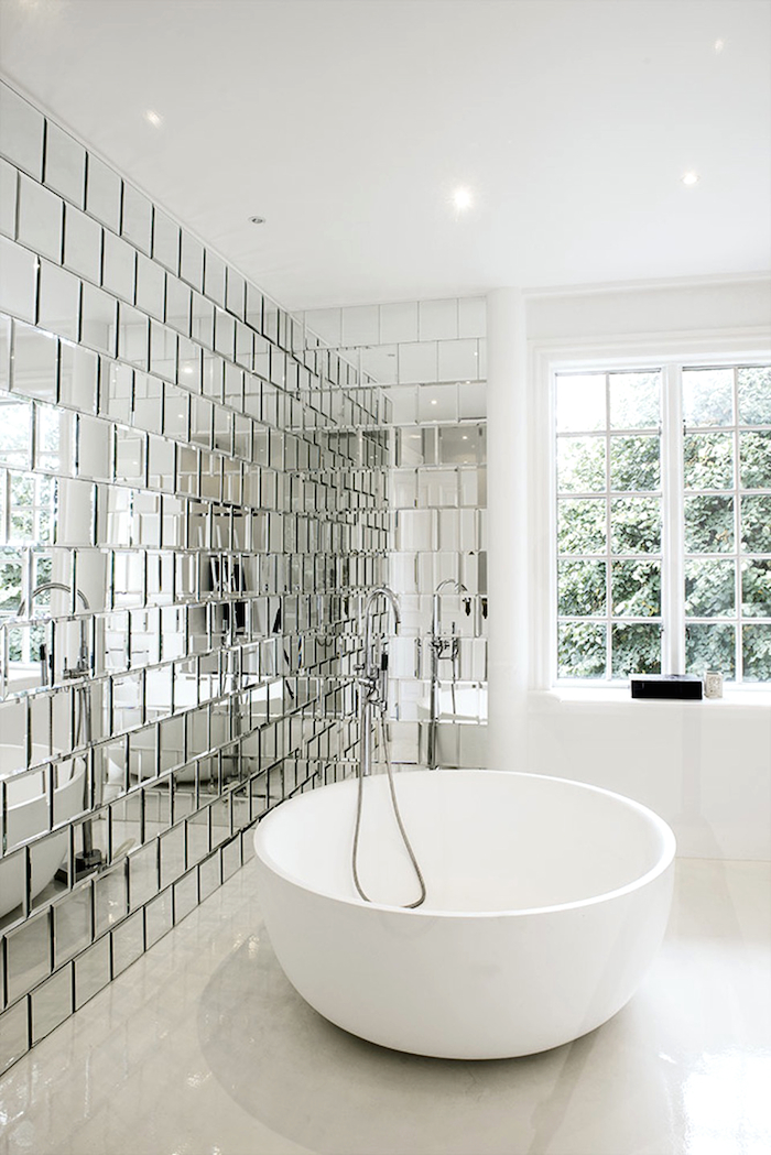 beveled-mirro-tiles-circular-bathtub-photo-jesper-ray.jpg