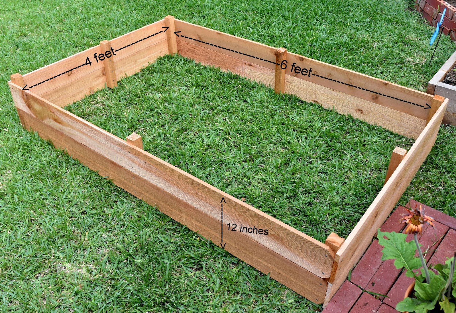 Veena Chimes Raised Beds With Cedar Pickets