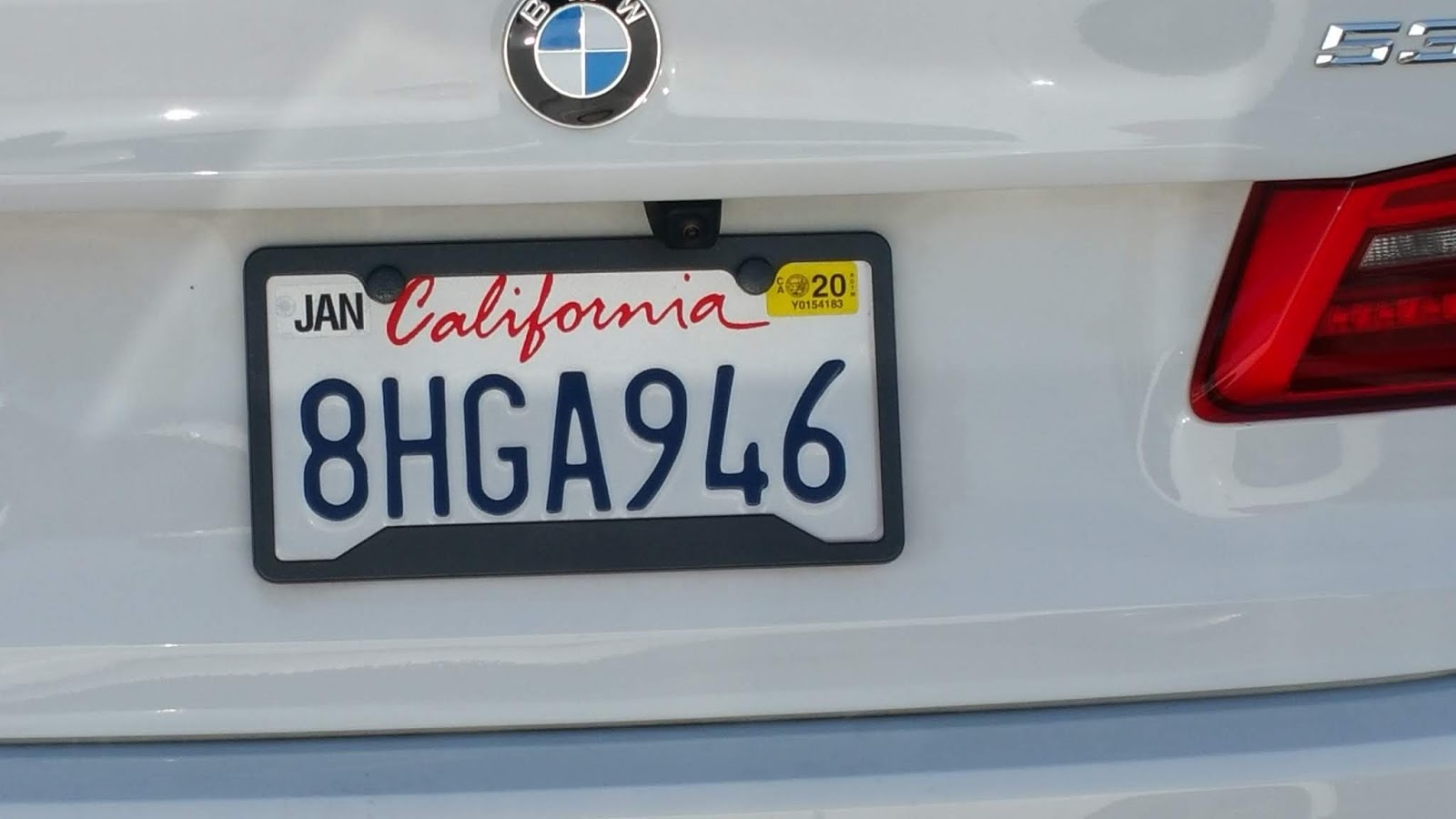 Just A Car Guy: Hmmm, what's the reason there are 2 different styles of  registration stickers on the California license plate?