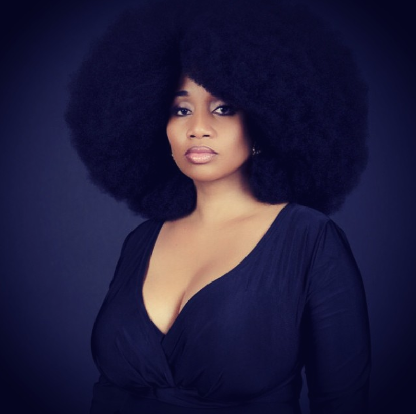 Aevin Dugas Holds The Guinness World Record For Largest Afro