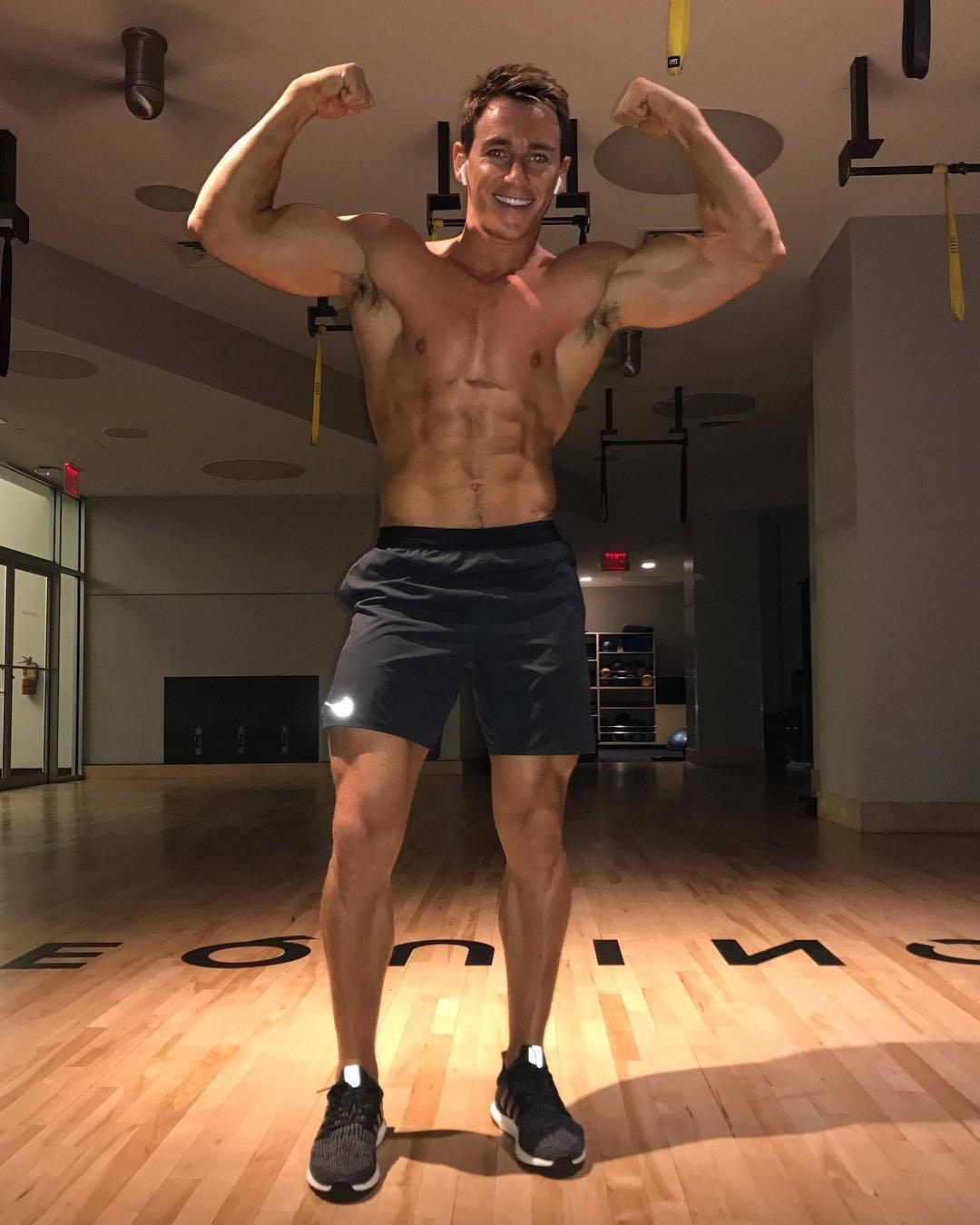 cute-gym-dude-smiling-fit-barechest-body-abs-flexing-biceps