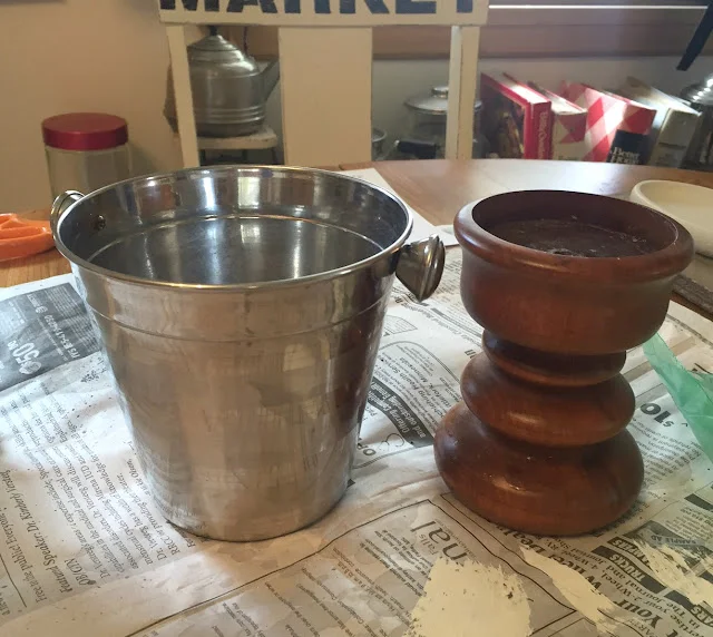 Photo of thrifted items to be repurposed as another urn