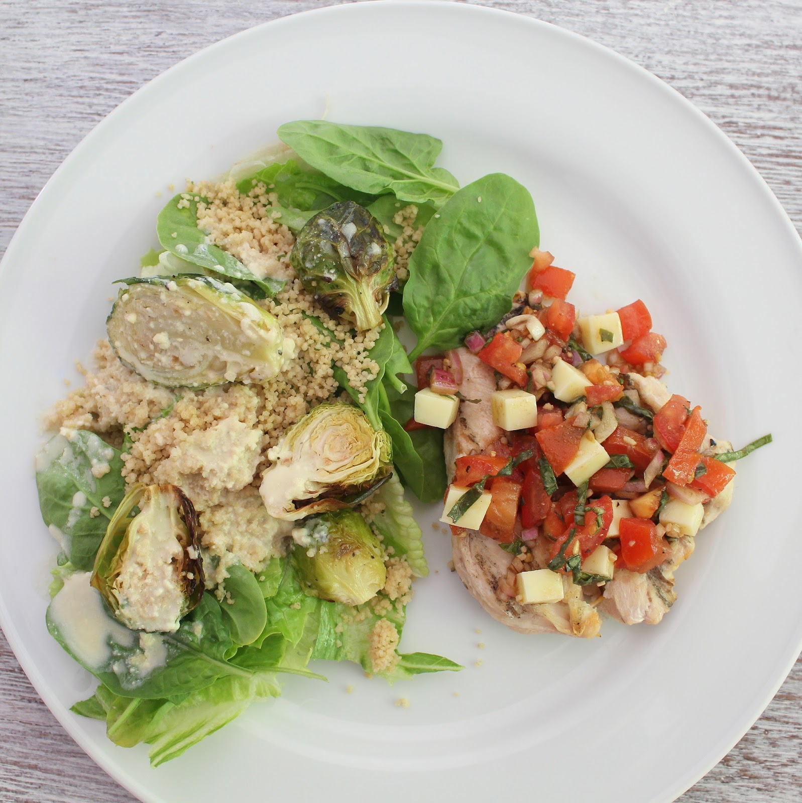 Grilled Chicken Bruschetta With Roasted Brussels Sprouts and Couscous Salad