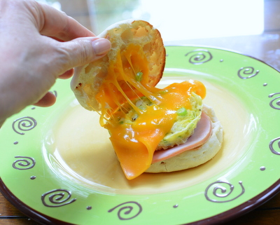 Homemade Egg McMuffin ♥ KitchenParade.com, how to cook an egg or two in the microwave, creating a tender, tasty round just the right size to tuck into an English Muffin with melty cheese and Canadian bacon. Workday Easy. High Protein. Kid Friendly.