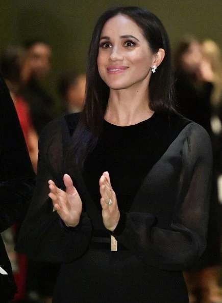 Meghan Markle wore Givenchy velvet Appliquéd midi dress, Birks snowflake snowstorm diamond earrings, Aquazzura Deneuve pumps, carries Givenchy clutch