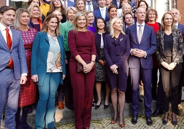 Queen Maxima visited Museum Van Loon, and VU University. The Queen wore a burgundy sweater and pants by Natan