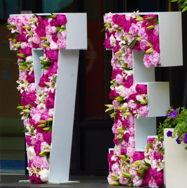 Floral letters in Sloane Square, London, for Chelsea in Bloom 2018 free flower festival