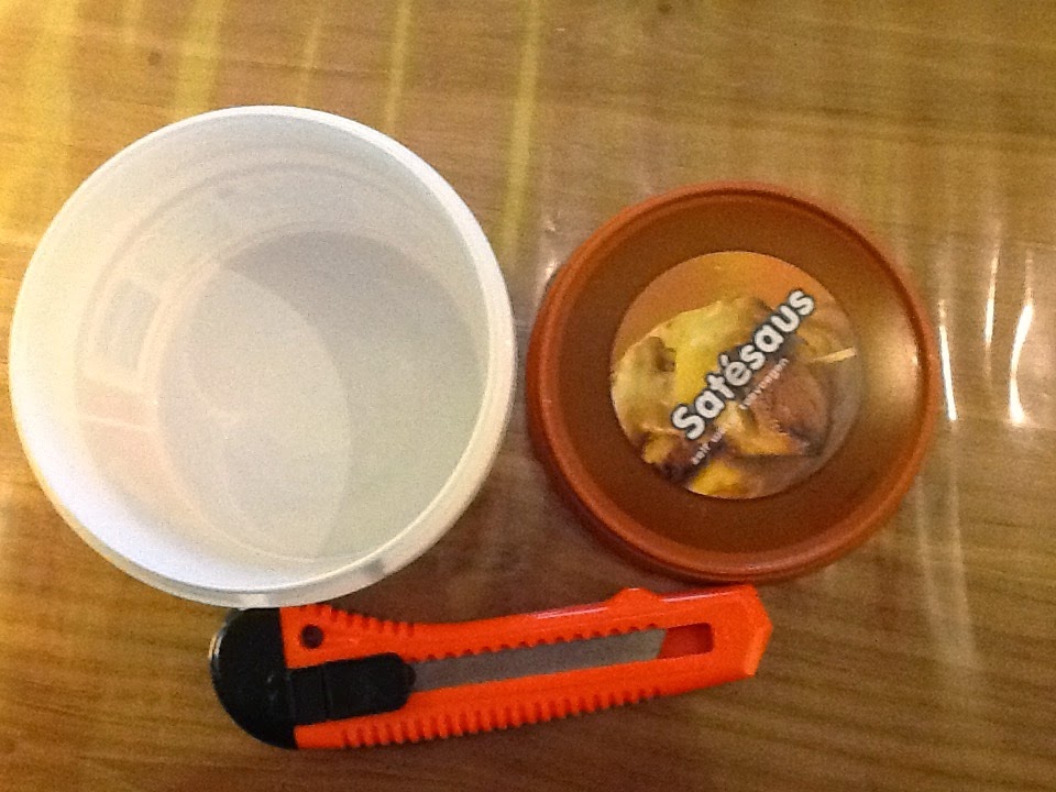 Windstil Zelf gemaakte slakkenval, met deksel tegen de regen