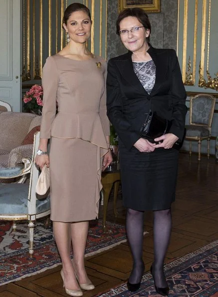 Crown Princess Victoria met Ewa Kopacz. Princess is carrying a Chanel Clutch and wearing LK Bennett nude pumps