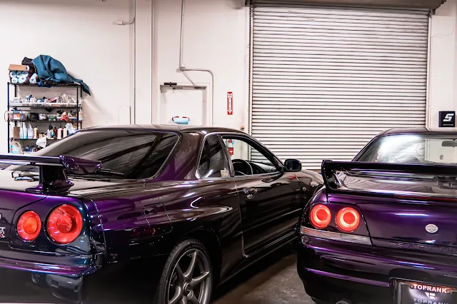 Midnight Purple II R34 GT-R and Midnight Purple R33 GT-R at Toprank Importers