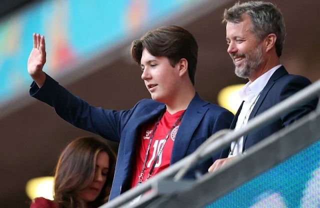 Crown Princess Mary wore a red crepe blazer from Alexander McQueen. Crown Prince Frederik and Prince Christian