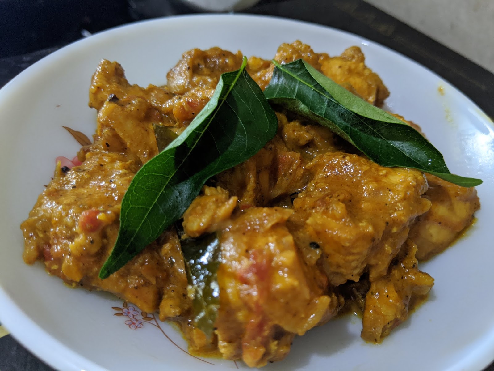 Kerala style chicken curry with coconut milk