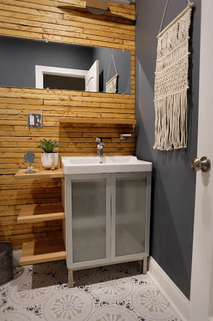 view of hacked Ikea bathroom cabinet and decor