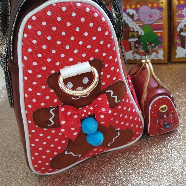 side of gingerbread man handbag with matching mini bauble